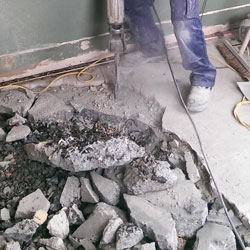 breaking concrete floor